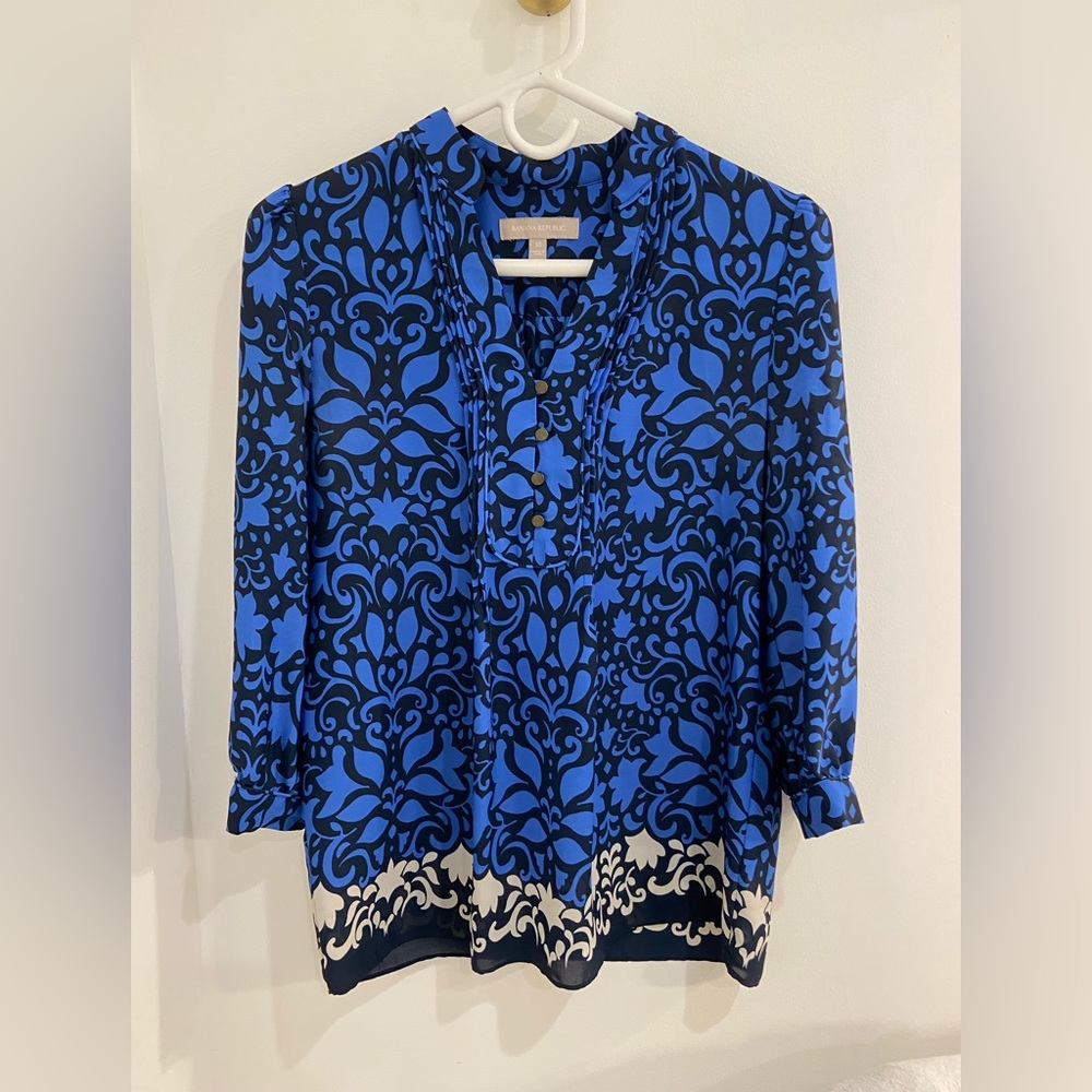 Blue and black patterned blouse